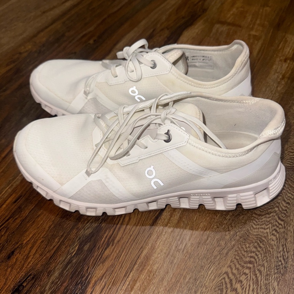 On Running White Minimalist Slip-On Sneakers